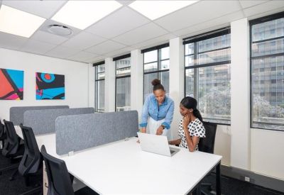 Two-person office with a city view.