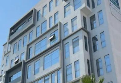 Modern multi-story facade of 7 Boulevard Abdelmoumen in the Casablanca Central Business District.