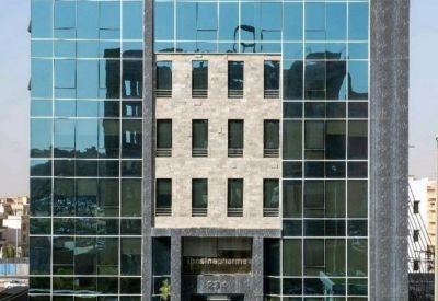 Exterior view of the glass-facade التسعين الجنوبي building in New Cairo.