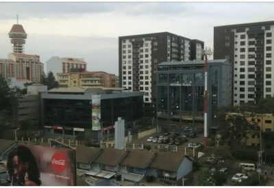 Elevated city view of the surrounding Nairobi neighborhood and commercial buildings.