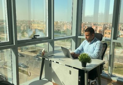 Private office at Lotus 2 Building, North 90th Street, Lotus District, New Cairo featuring floor-to-ceiling windows.