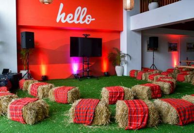 Vibrant event space at The Address Building, 7th Floor, Muthangari Drive, Nairobi with hay bale seating.