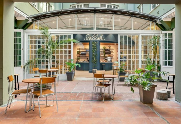 Spacious sunlit courtyard at Neighbourgood Workspace, 129 Bree Street, Cape Town, South Africa.