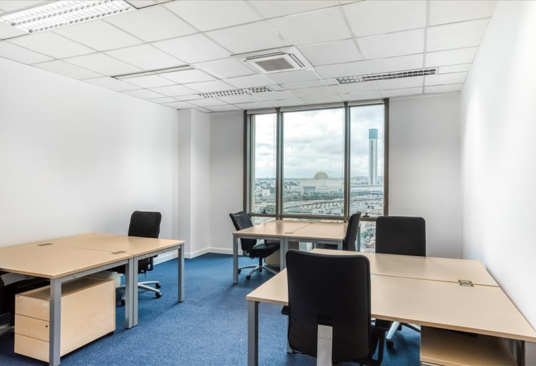 Spacious three-desk private office with large windows overlooking Pins Maritime, Mohammadia, Algiers, Algeria.