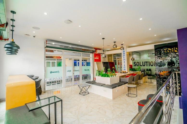 Spacious communal lounge at 60 Ekwema Crescent, Ikenegbu Layout, Owerri, Nigeria with modern seating and natural light.