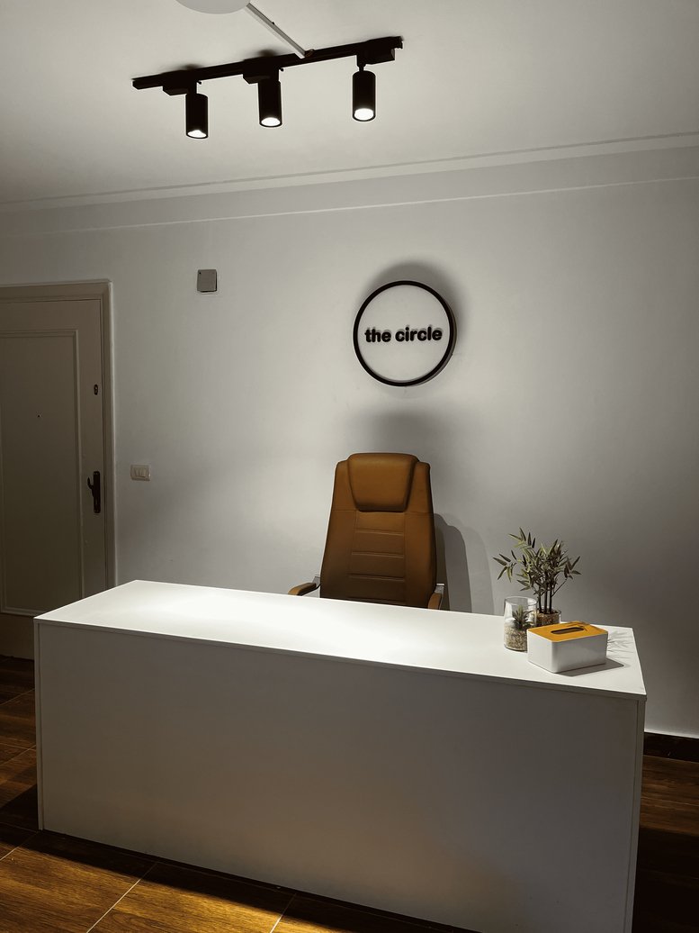 Bright reception desk at The Circle, 15 Syria Street, Roushdy, Alexandria, Egypt.