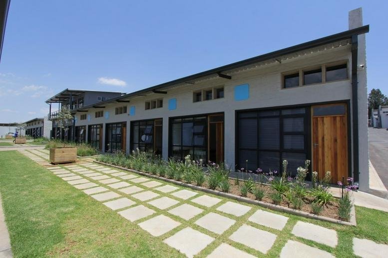 Exterior facade of the industrial-style office park at 11 Havelock Road, Willow Park Manor.
