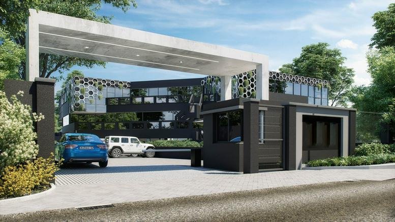 Exterior view of the modern glass facade entrance at 138 Kelvin Drive, Sandton.