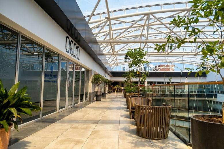 Bright, modern outdoor terrace at Zone Mall, 2nd Floor, 177 Oxford Road, Rosebank, Johannesburg.