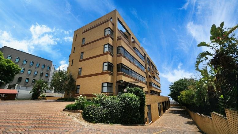 Exterior view of the multi-story brick building at 308 Kent Avenue, Randburg, Johannesburg, South Africa.