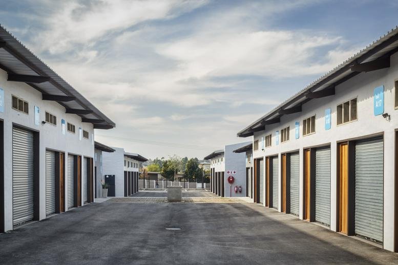 Exterior view of the warehouse-style office buildings at 472 Spionkop Avenue.