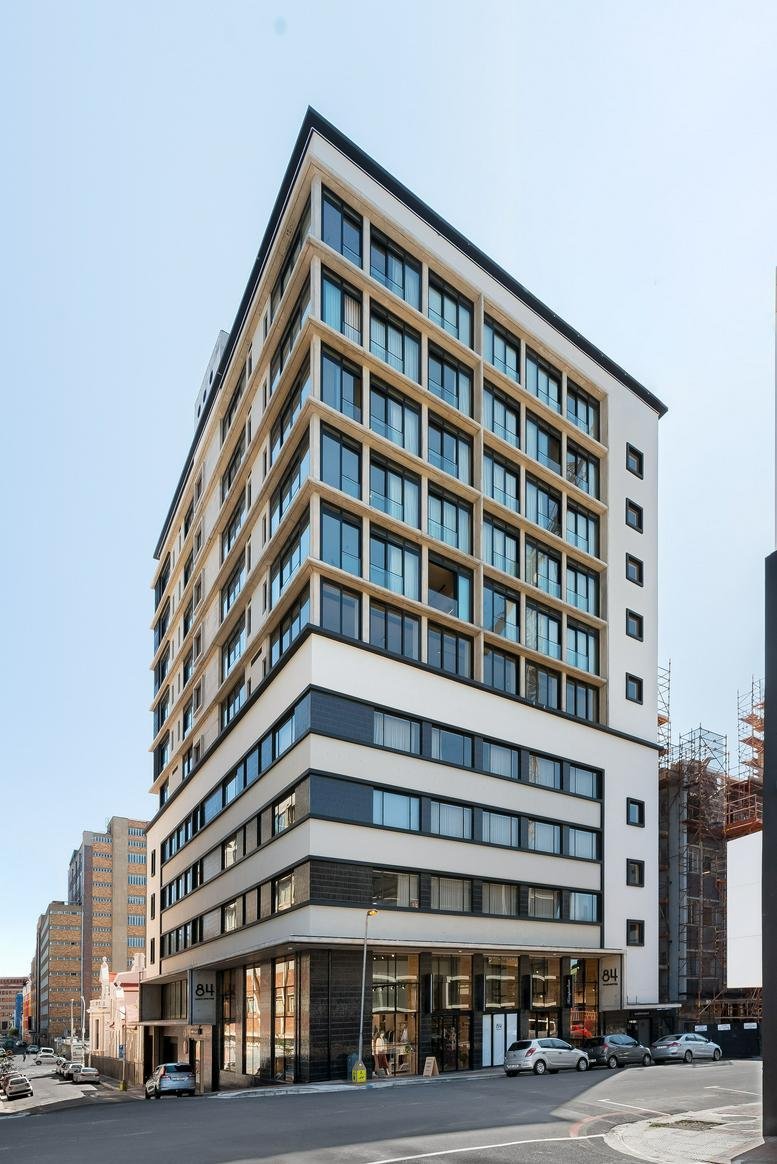 Exterior view of the modern grid-facade building at 84 Harrington Street, 5th Floor, Cape Town, South Africa.