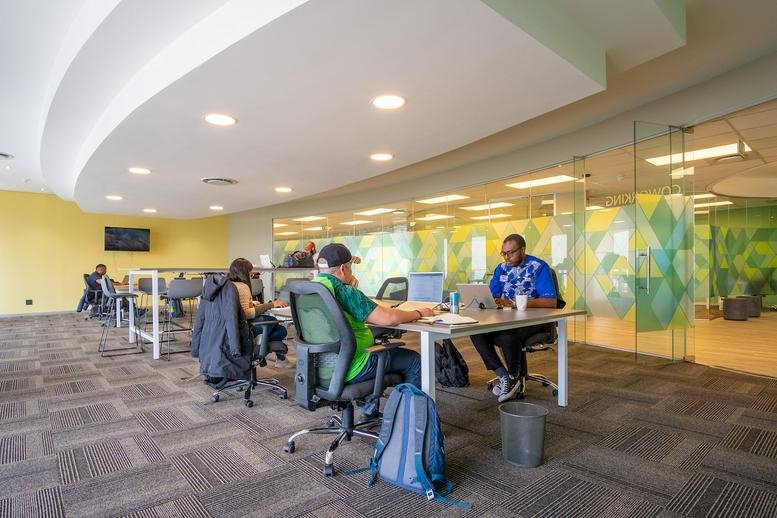 Spacious coworking area at Cedar Square, 2nd Floor, Cedar Road, Fourways, South Africa with modern desks and natural light.