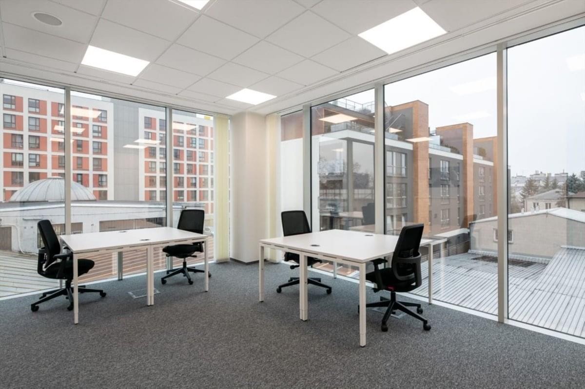 Spacious private office at East Rand Mall, 1 Bentel Avenue, with floor-to-ceiling windows and city views.