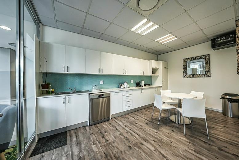 Modern communal kitchen at Woodmead North Office Park, Block B, 54 Maxwell Road.