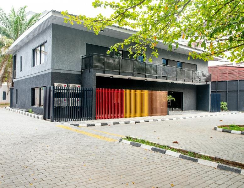 Exterior view of the contemporary gray and black building at 16 Idowu Martins Street.