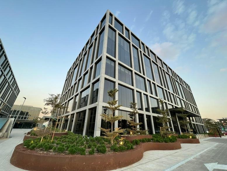 Exterior view of the glass and concrete facade at Cairo Festival City, Office 112 Building P1, The Podium.