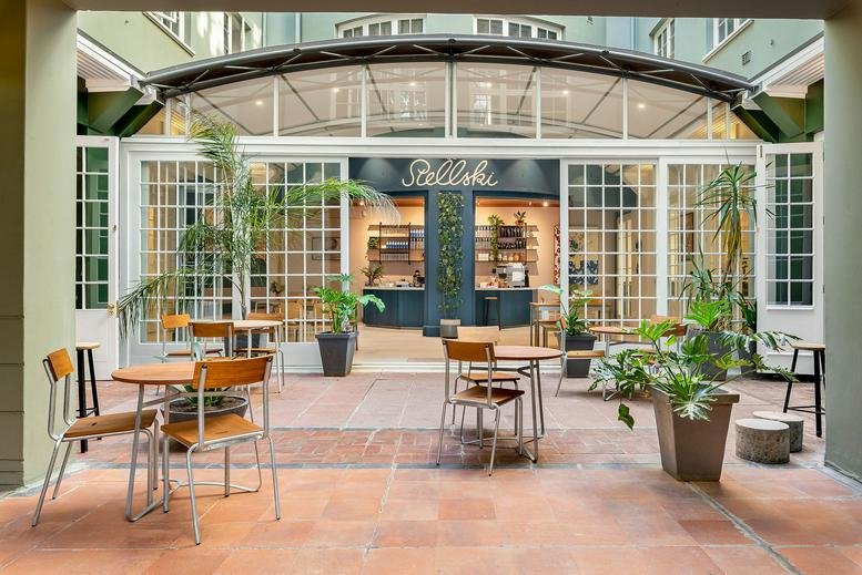 Spacious sunlit courtyard at Neighbourgood Workspace, 129 Bree Street, Cape Town, South Africa.