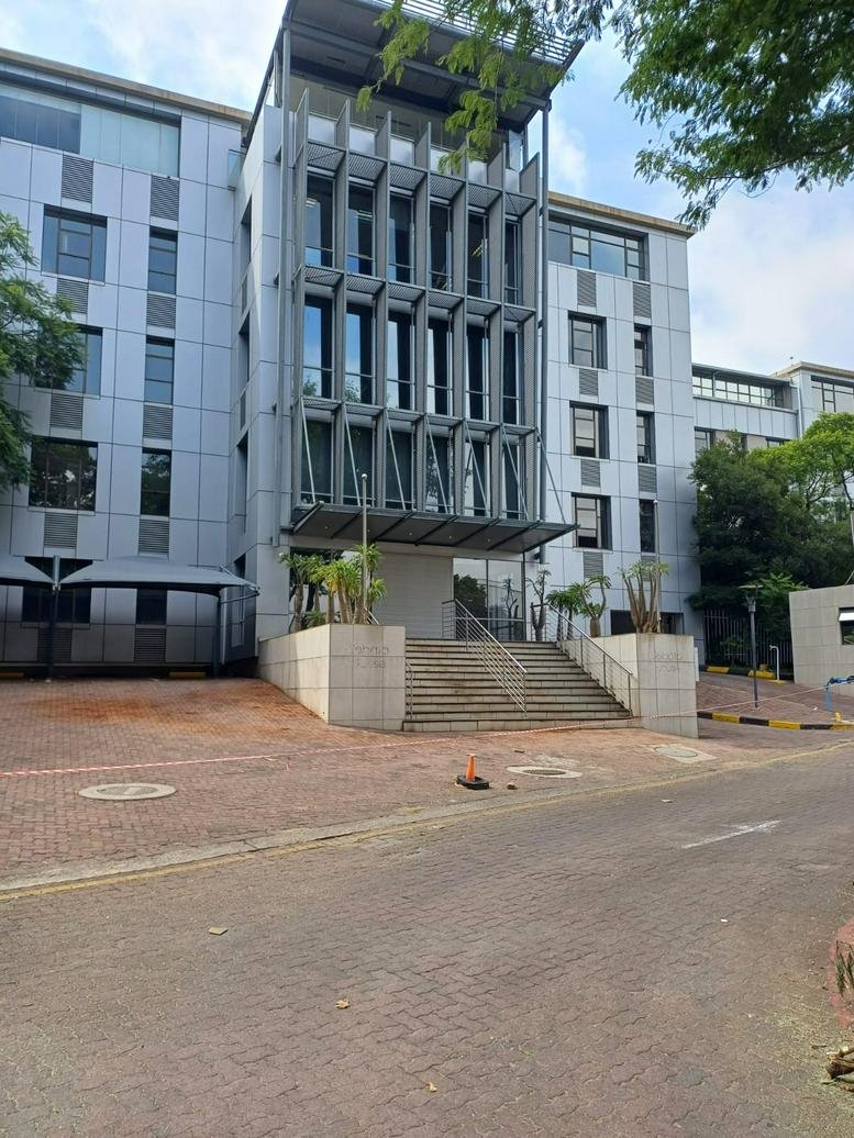 Exterior facade of the office building at 151 5th Street, Sandton, South Africa with modern metal louvers.