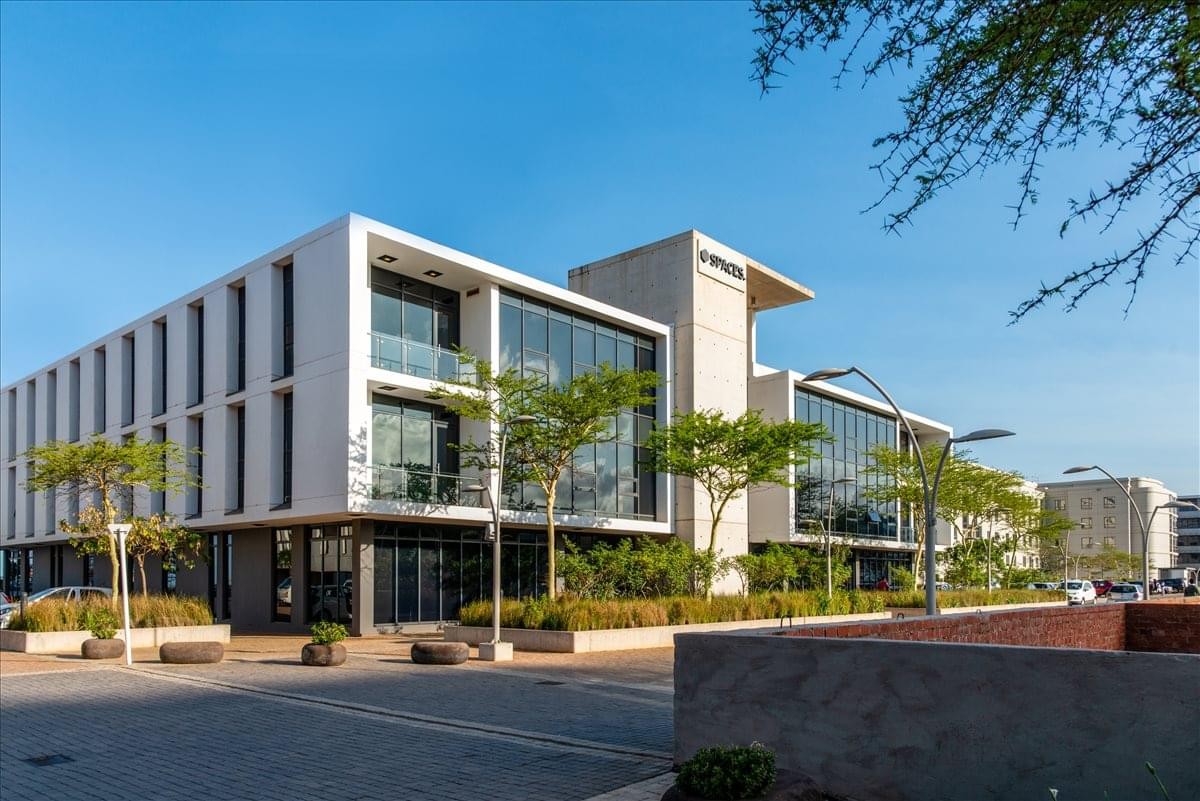 Exterior view of the modern white-facade building at 2 Ncondo Place, Ridgeside.