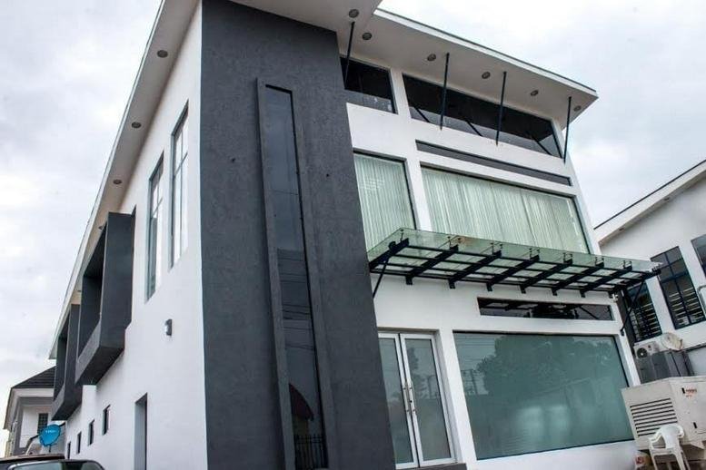 Exterior view of the modern black and white building at 5, Isaac John Ikeja Gra, opposite Adam and Eve.