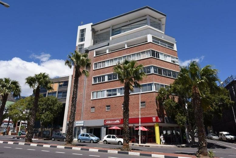 Exterior view of the red brick building at 62 Roeland Street, Gardens, Cape Town, South Africa.