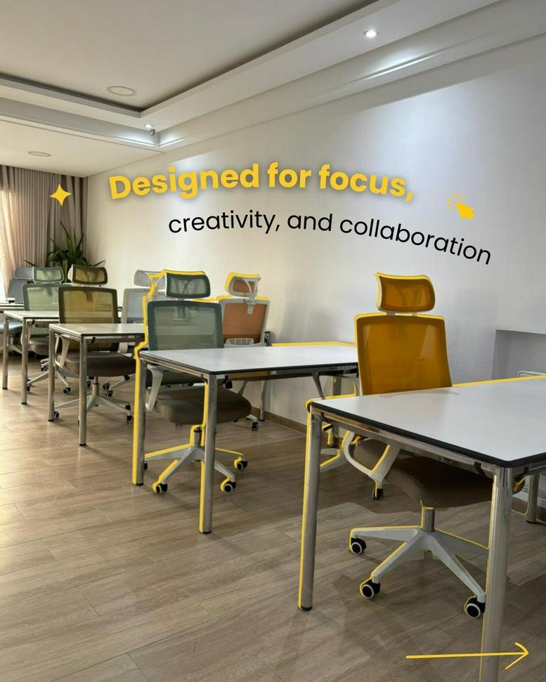 The modern open-plan office interior at Hive12, 65 شارع الجمهورية featuring bright yellow chairs.