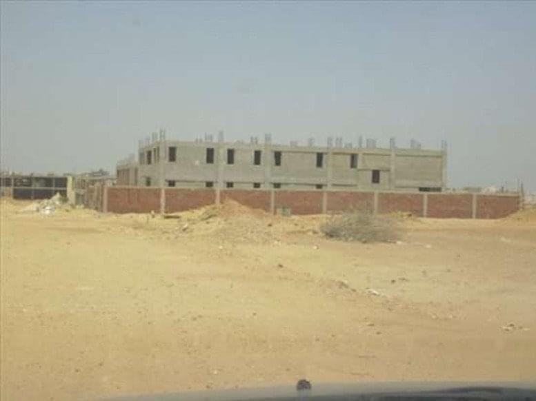 Exterior view of the Cairo-Alexandria Road, Abu Rawash, Smart Village building under construction.