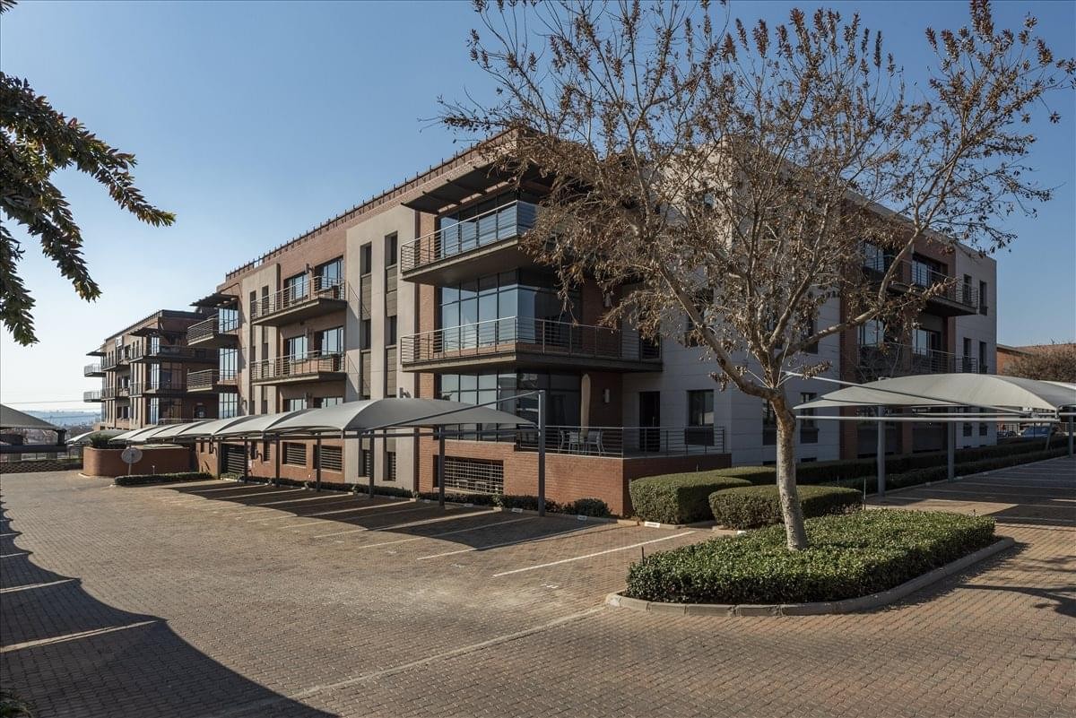 Exterior view of the contemporary brick and glass facade at Block C, Stoneridge Office Park.