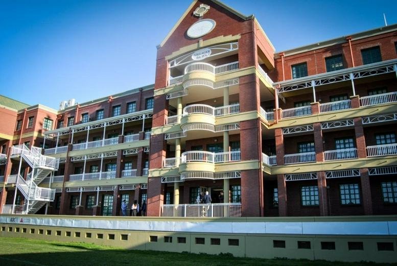 Exterior view of the red brick facade at Brookside Office Park, 11 Imam Haron Road, Claremont, Cape Town.