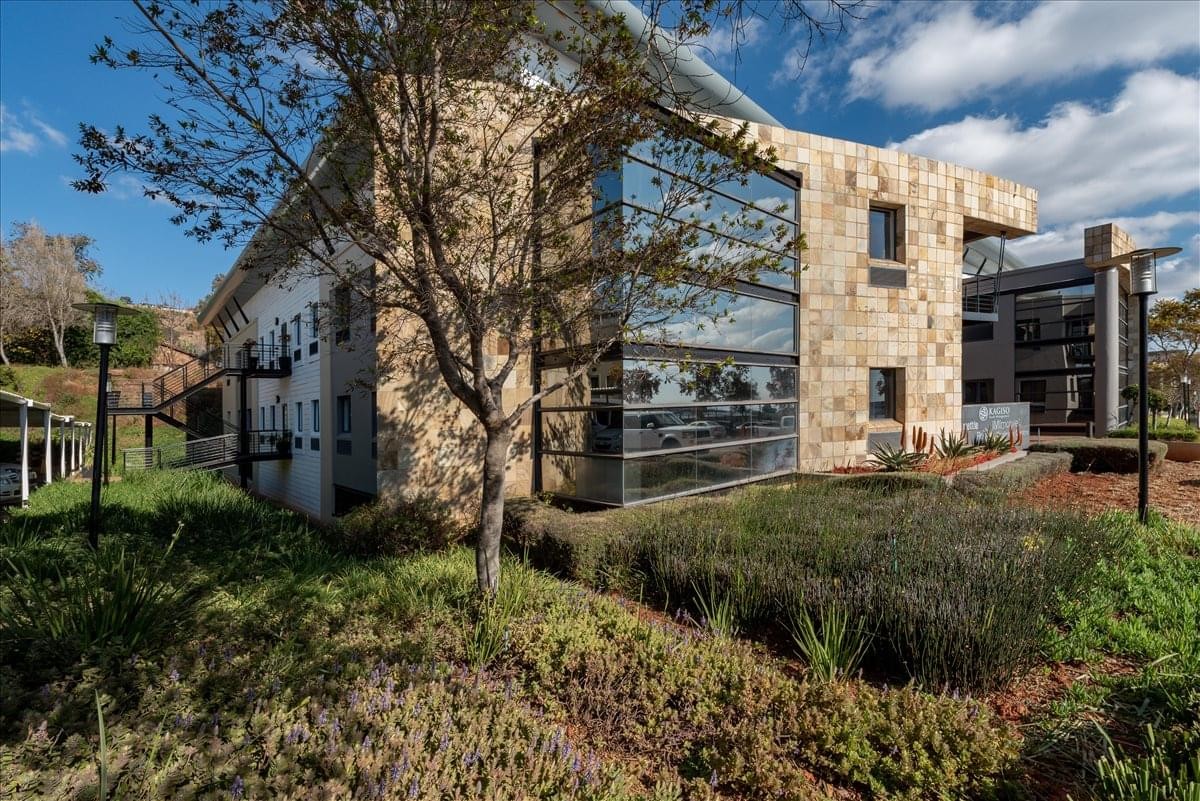 Exterior of the stone and glass Clearwater Office Park, Building 3.