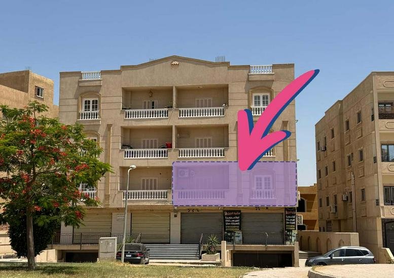 Exterior view of the El Location Coworking Space, Fifth District, El Obour City building facade.