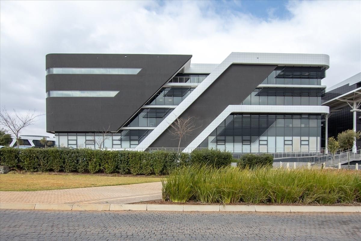 Exterior view of the modern, geometric facade of Byls Bridge Office Park, Building 14.