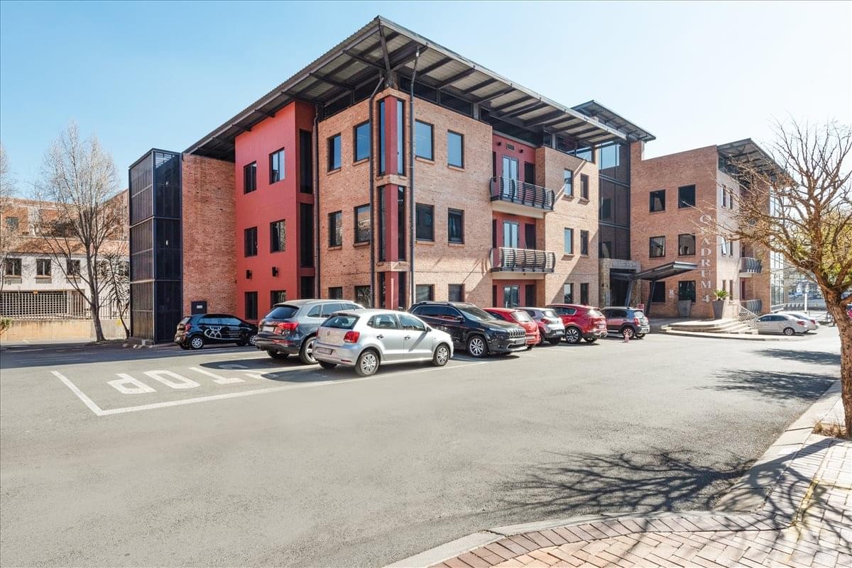 Exterior view of the brick-facade building at 4 Quadrum Office Park.