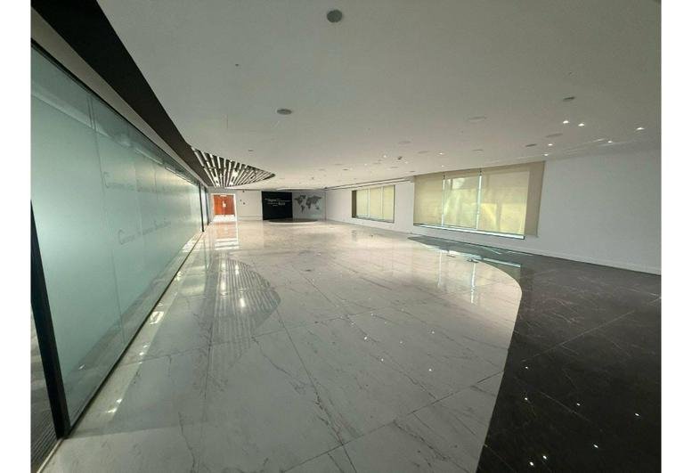 Spacious marble lobby at North 90th Street, Service Lane, New Cairo, Egypt with glass partitions.