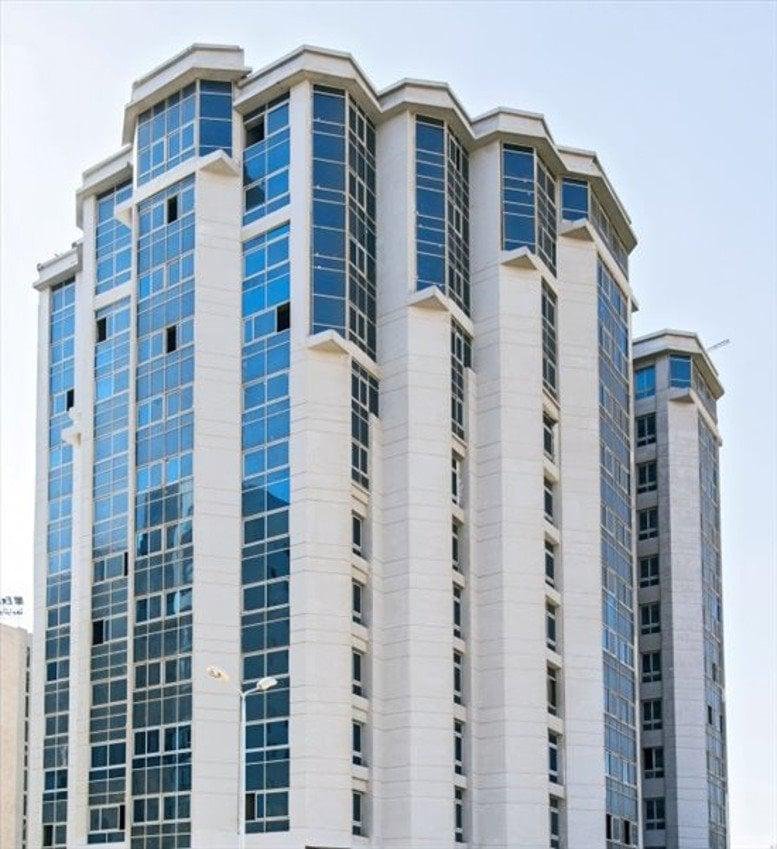 Exterior view of the glass-facade Tower 12, Bavaria Town, Ring Road.