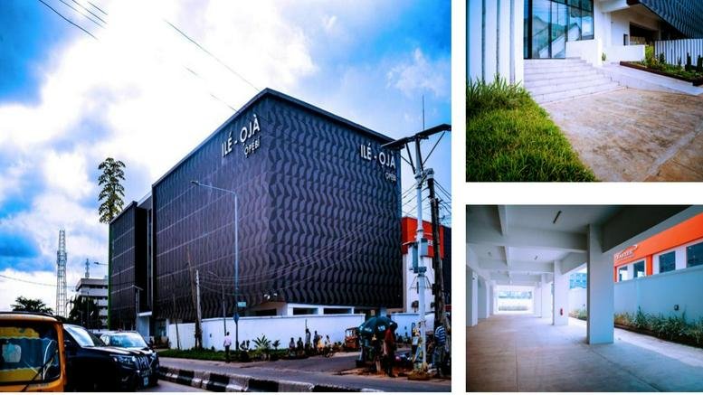 Modern dark-facade exterior of the Opebi Campus, Opebi, Ikeja, Lagos, Nigeria building under a bright sky.