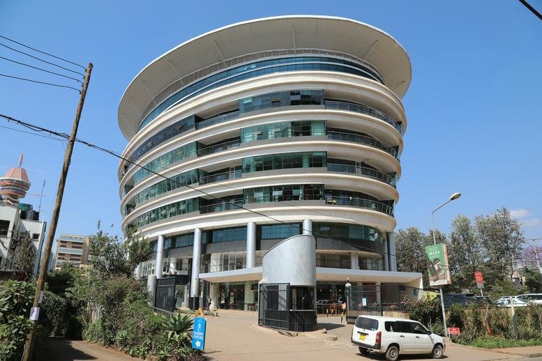 Exterior view of the curved glass facade of the Executive Centre, Westlands Business District.