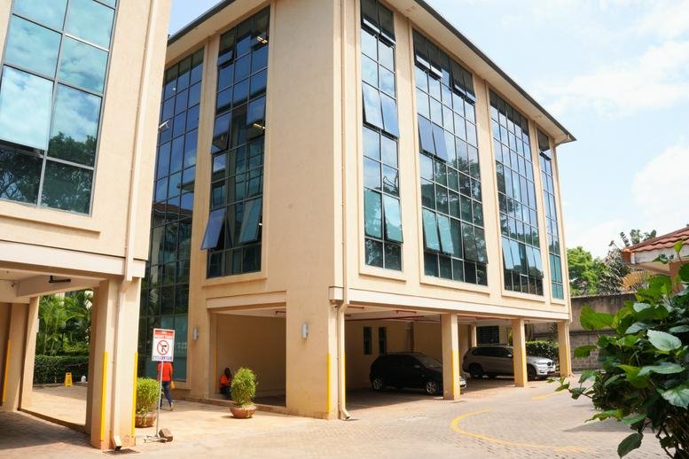Exterior view of the modern glass-facade Delta Riverside, Riverside Road building.