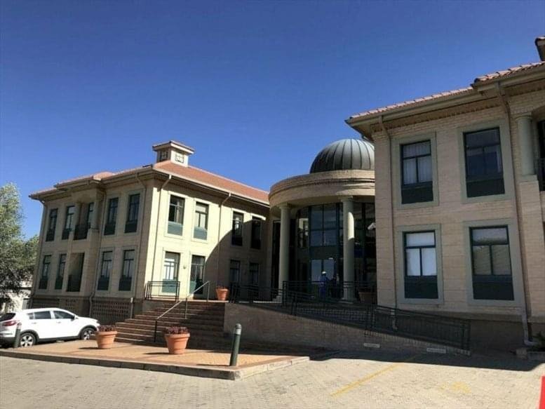 Exterior view of the classic architecture and domed entrance at Coral House, 20 Peter Place.